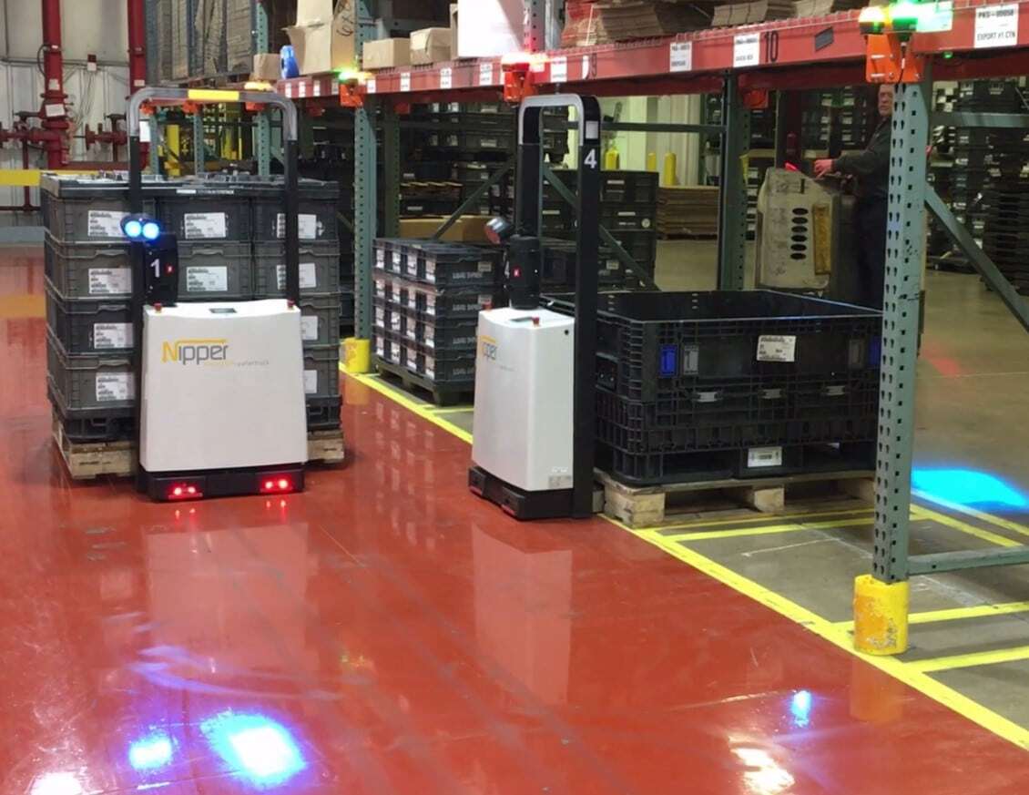 Two of the AGVs working together.